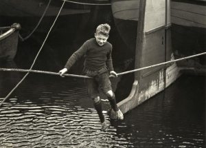 young maverick crossing water